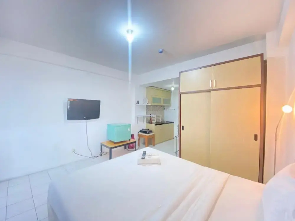 Spacious Studio Room with Sofa Bed at Emerald Towers Apartment