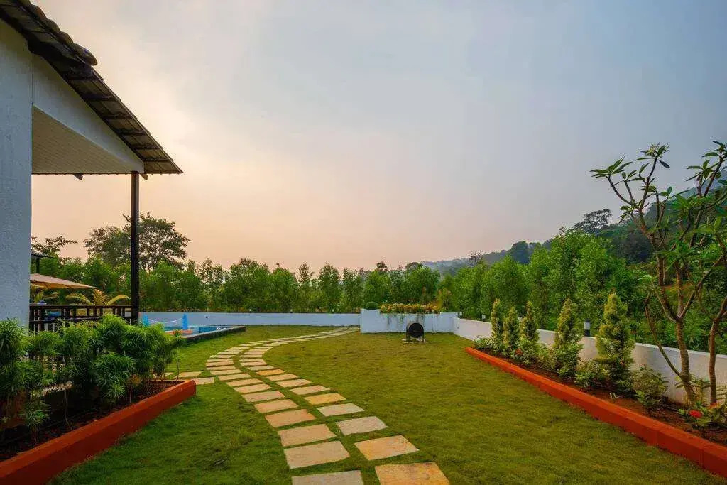 SaffronStays Turquoise Maison - 3BR pool villa with jacuzzi, bonfire & fruit garden near Lake Kalote, Karjat