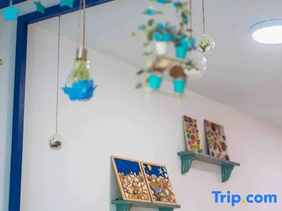 Sam 11 @ Imago Loft blue sand ocean Located upstairs at the Imago mall