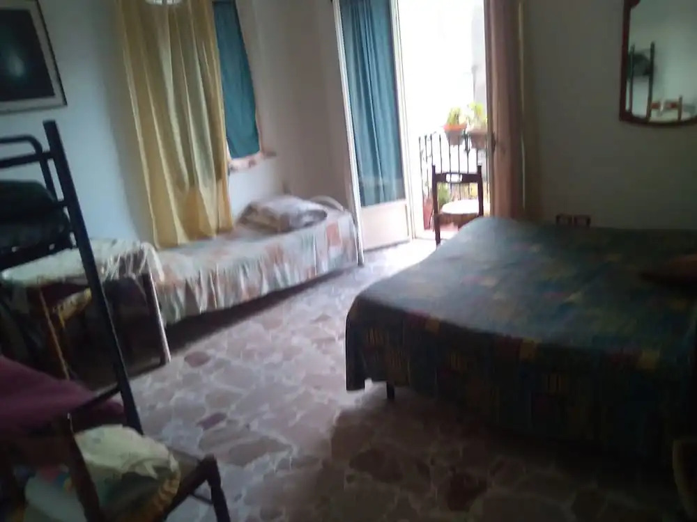 Single room with shared bathroom