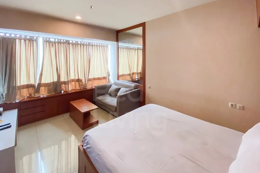 RedLiving Apartemen Grand Kamala Lagoon by Ownr Room