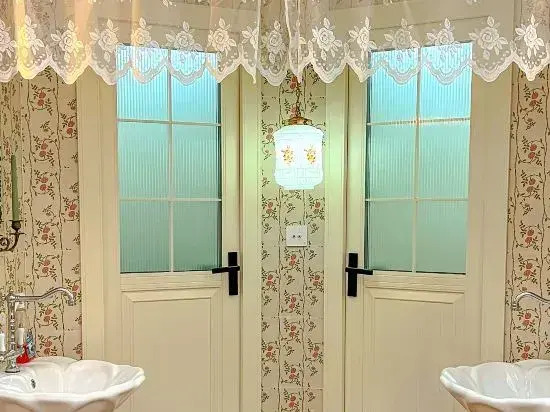 Desert Island Rose Antique Homestay (Leshan Shihao Plaza High-speed Railway Station)