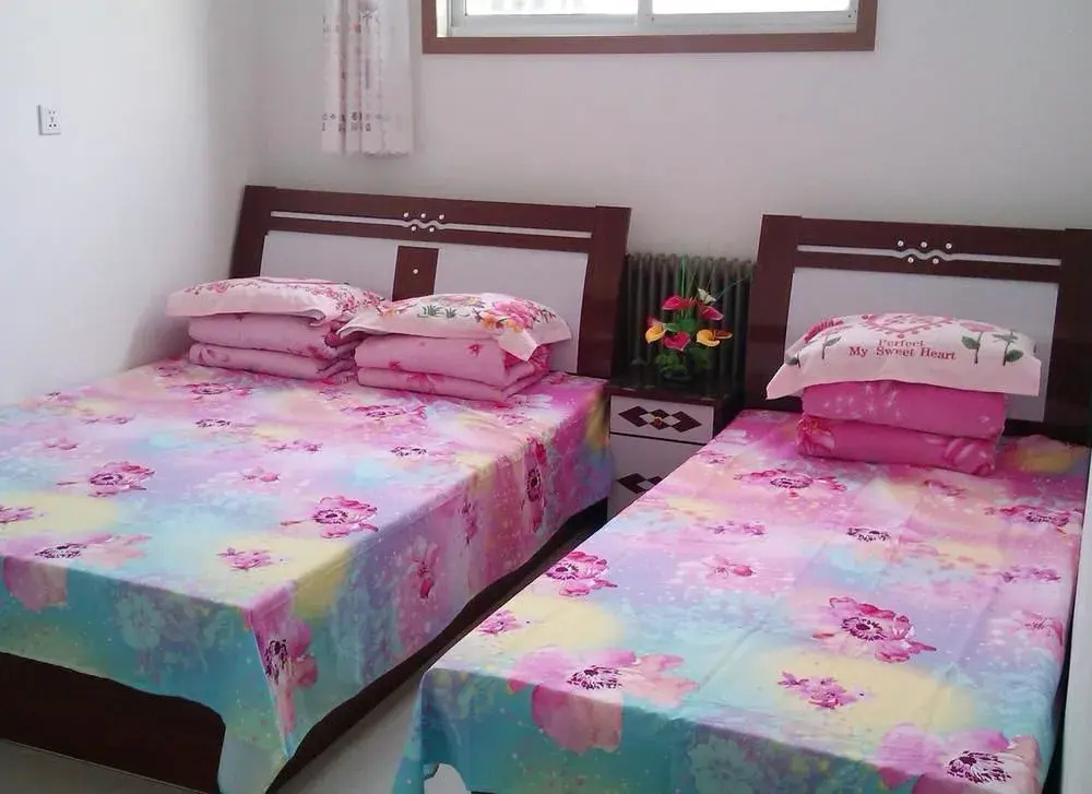 Rongjun Yujiale Hotel(蓬莱荣君渔家乐)