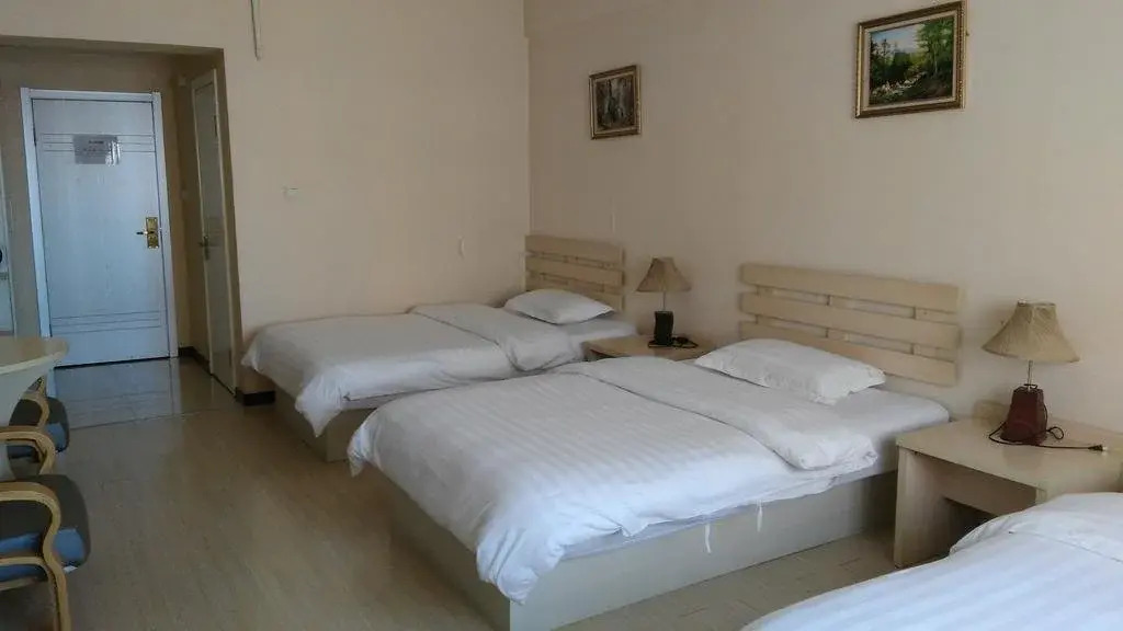 Super 9 Business Hotel