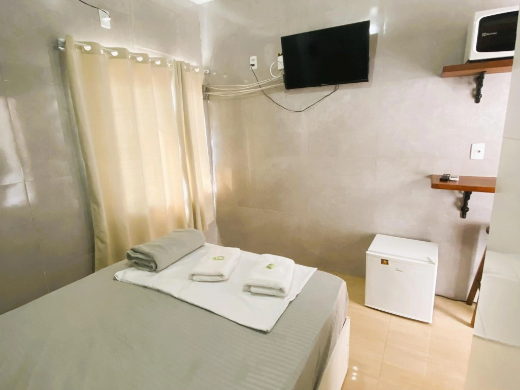 Perto da Meia Praia e do Píer com Cozinha Garagem Ar Wi-Fi e Enxoval - CASA OLINDA