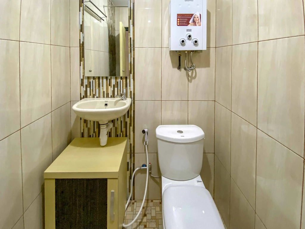 Tinis Guest House Malang Mitra RedDoorz
