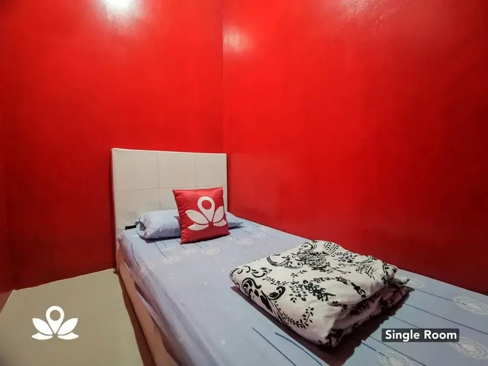 SPOT ON 89769 Mirzal Guest house