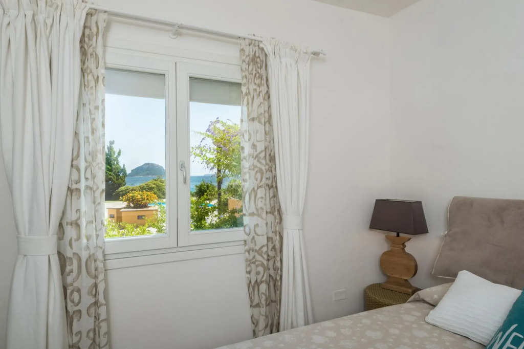 It features a large living area with fully equipped open kitchen and access to the covered terrace d-S'ABBA 1