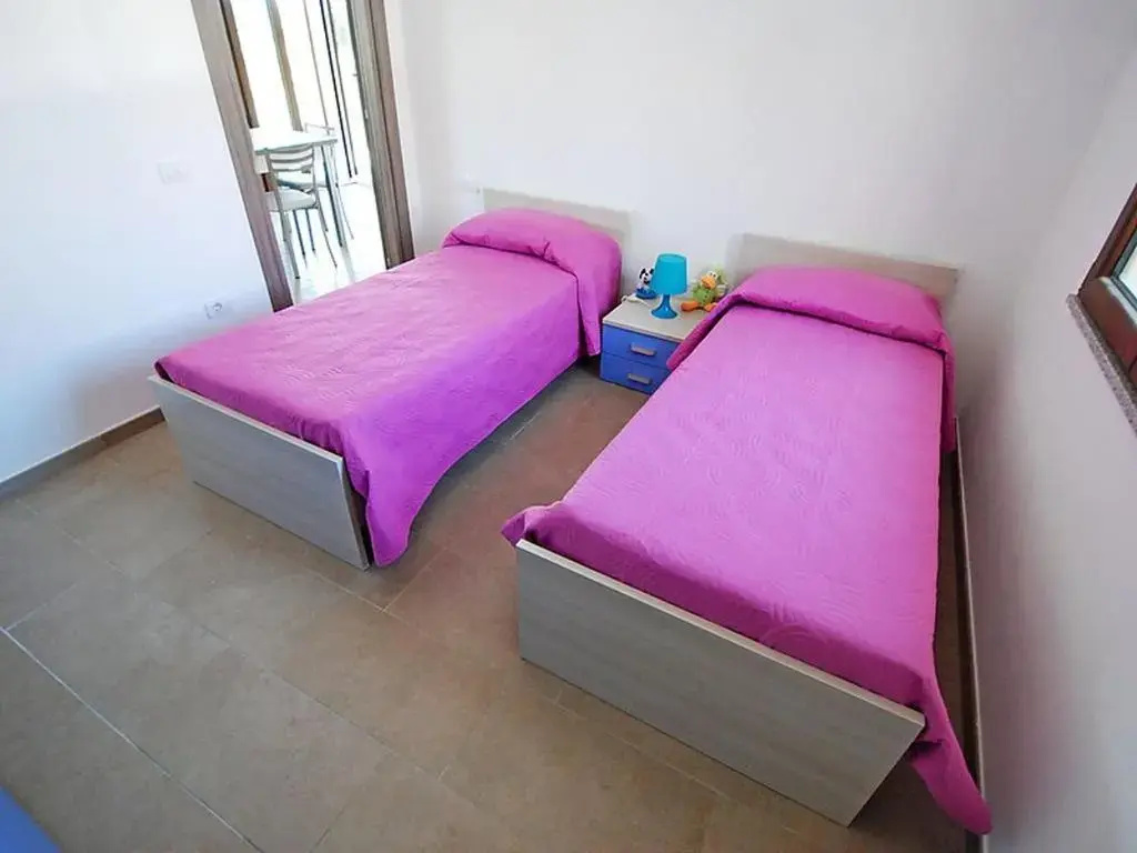 2 bedrooms house with enclosed garden and wifi at Sant'Anna Arresi 3 km away from the beach