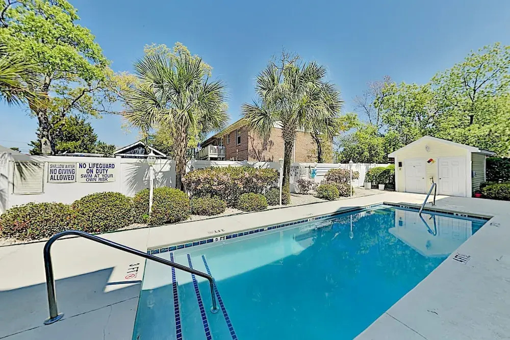 Sun-Soaked Beach Townhome w/ Sparkling Pool townhouse