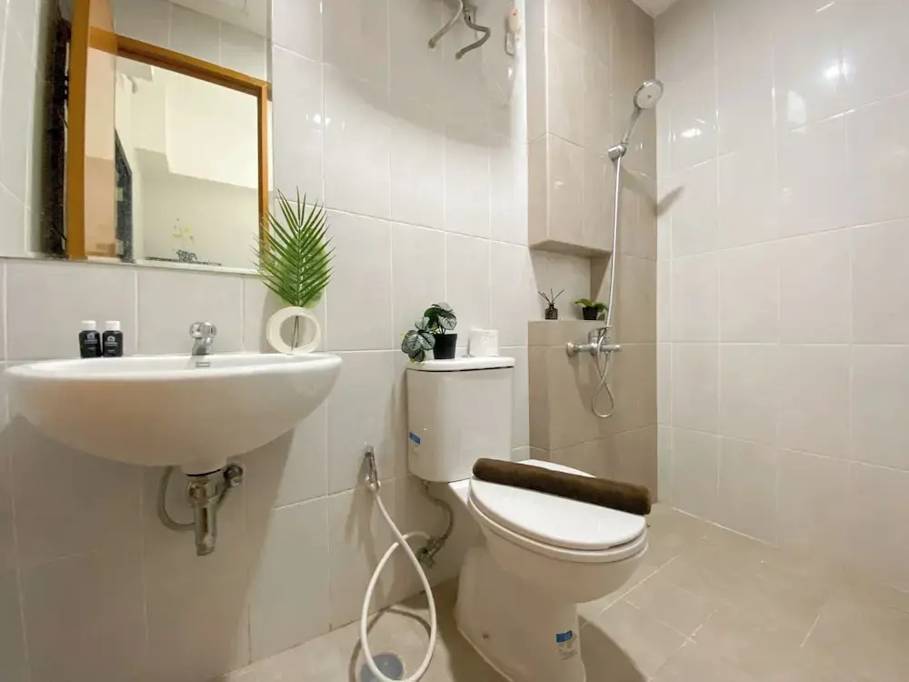 Minimalist And Cozy 1BR at Royal Heights Apartment