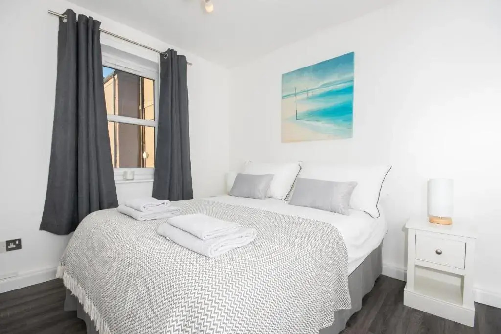 Find "DWELLCOME HOME Ltd" site for 10oo10 assurance from past guests - Immaculate Central 2 bedroom King & Double 1st floor Apartment with free allocated auto barrier off street parking, fast broadband Miles better than a hotel