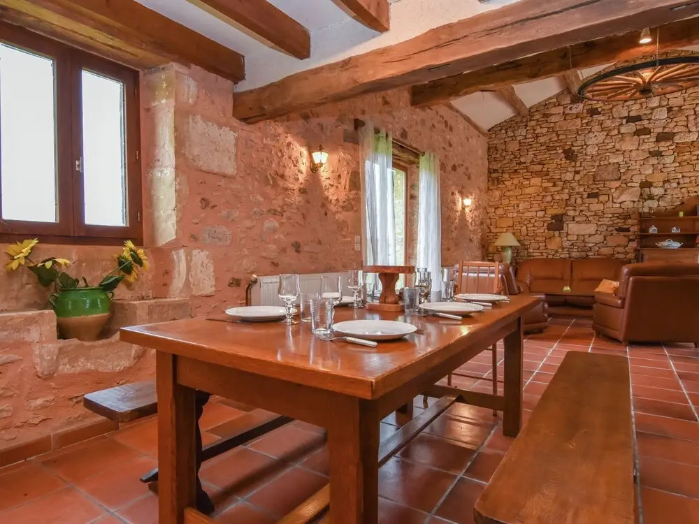Lovely holiday home in Biron with fenced swimming pool
