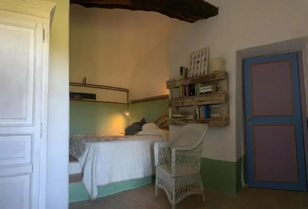 Casa del Piano Valle dei Calanchi in front of Civita Di Bagnoregio