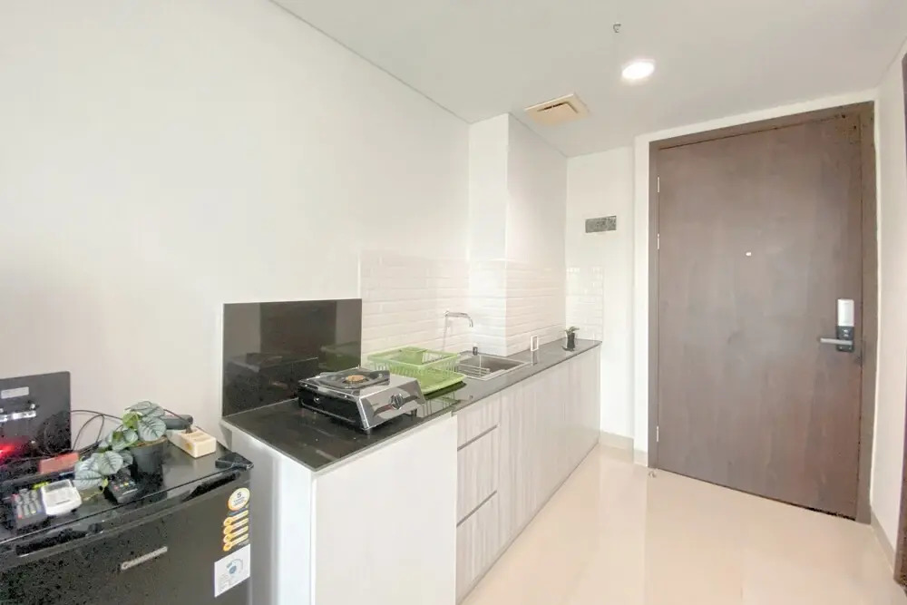 Simple White Designed Studio At Lrt City Bekasi Apartment