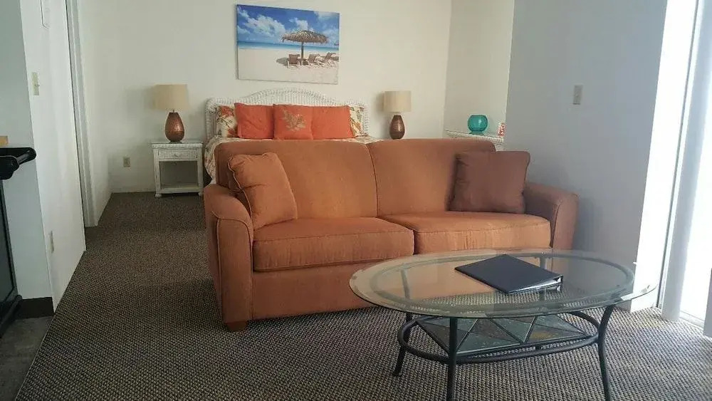 Estero Beach & Tennis #105B by RedAwning