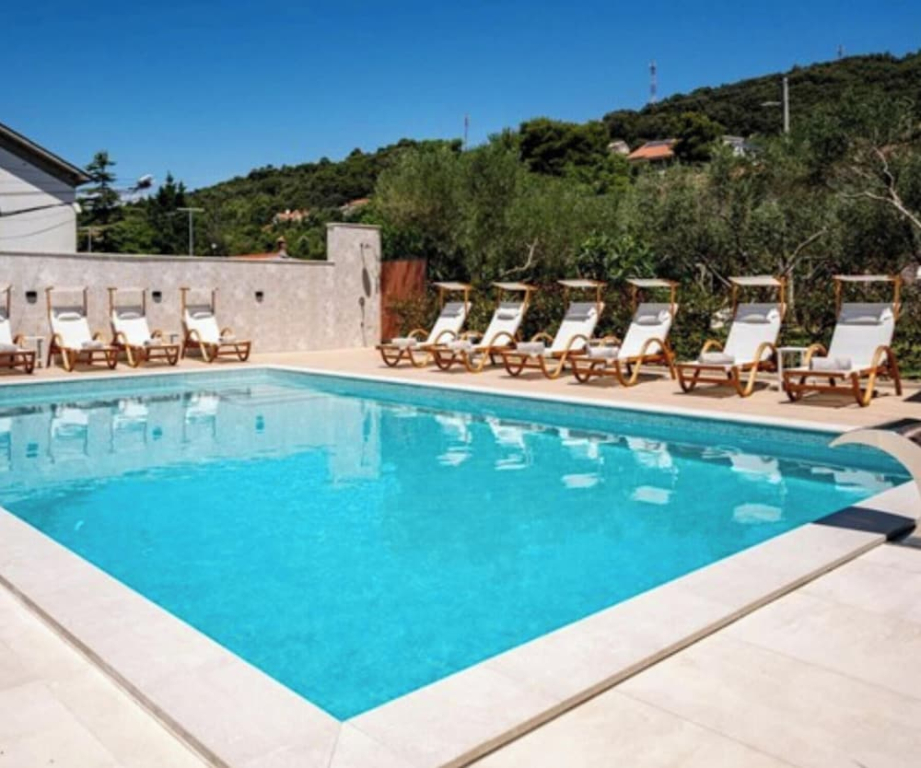 Apartments Foric Rab with Heated Pool, Sauna & Gym