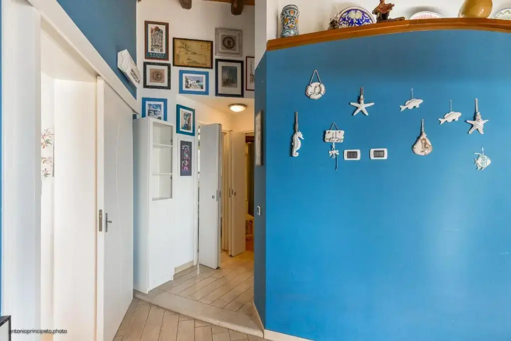 Blue house on the sea