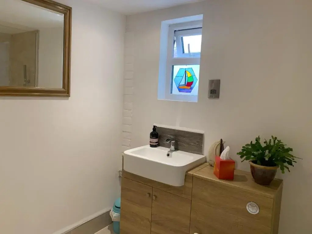 One bedroom self contained annex with own bathroom, sitting room and kitchenette