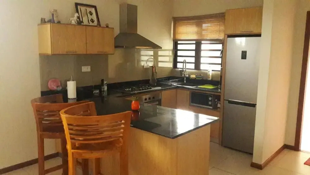 Apartment with One Bedroom in Grand Baie, with Pool Access, Furnished Garden And Wifi