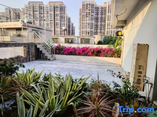Haikou Zhouren Apartment (Wanda Plaza Convention and Exhibition Center)