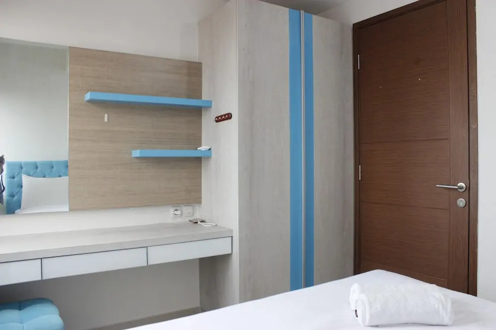 Homey 2BR Apartment at Sudirman Suite