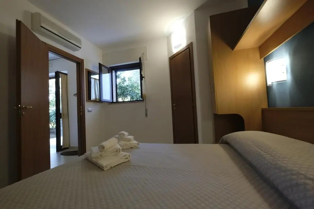 Apartment ulivo with pool and private beach