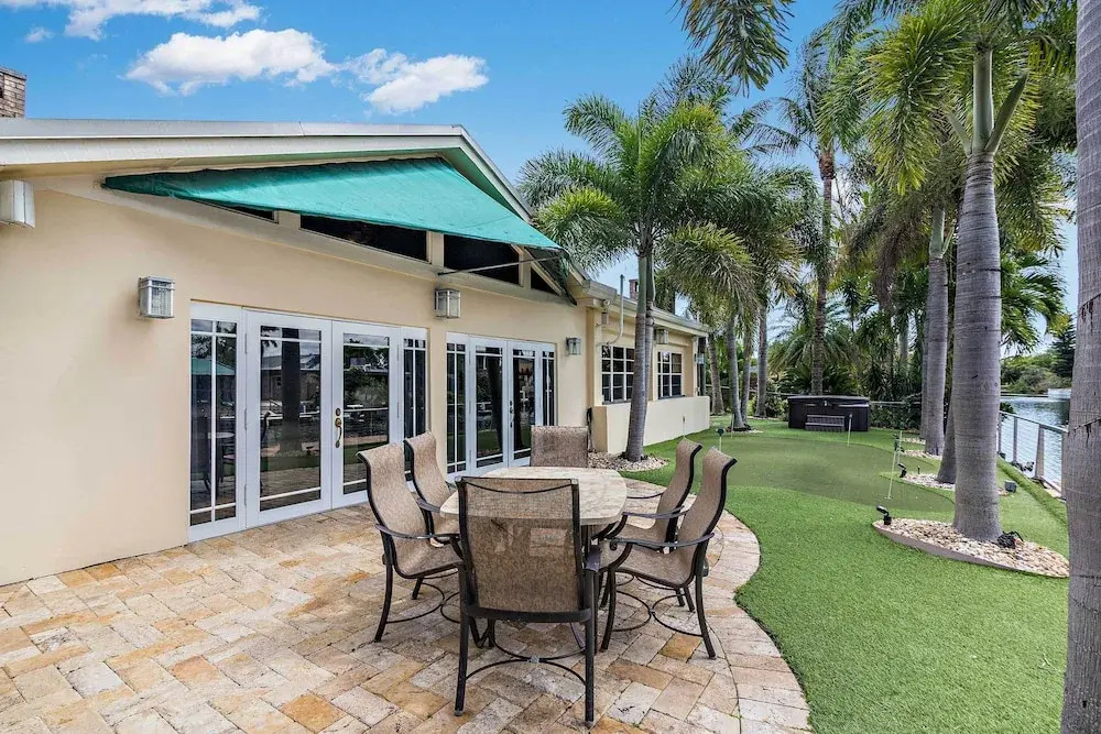 Sunny Waterfront Home by West Palm w/ Hot Tub!
