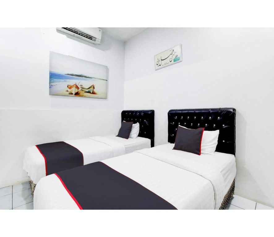 Hotel O Jalan Jenderal Sudirman Near Imam Bonjol Square Formerly Nelvi Guest House