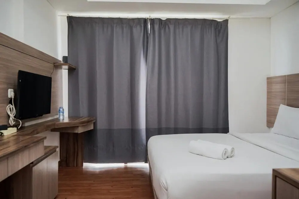 Comfort And High Floor Studio Room At Casa De Parco Apartment