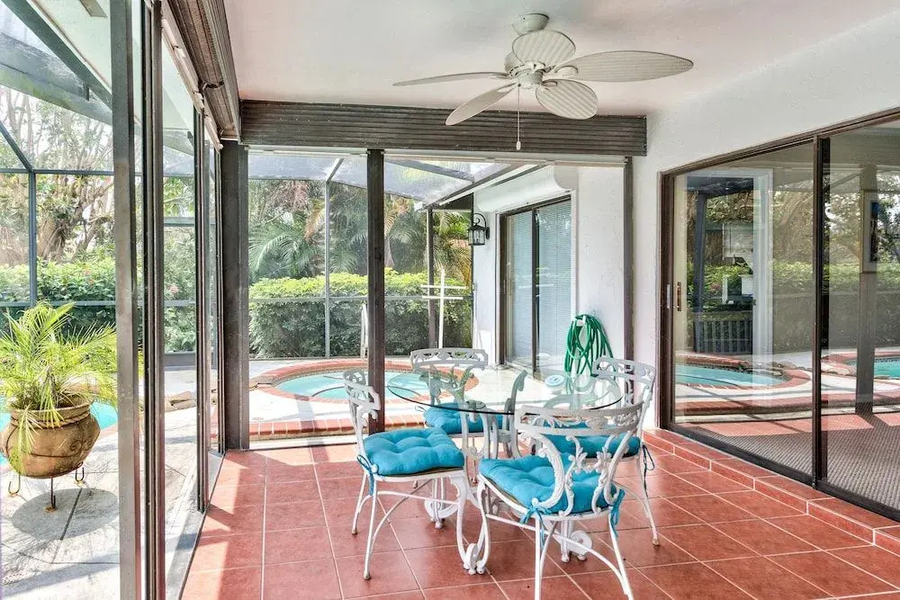 Rovigo Vacation Rental: Spacious Retreat with Panoramic Lake Views in Kings Lake. 4-BR, 4-Bathroom Home with Private Pool, just 3.4 Miles from the Vibrant Fifth Avenue South and Naples Attractions