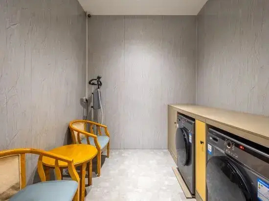 Xiangqing Qi'an Smart Hotel (Tunchang Central Commercial Plaza)