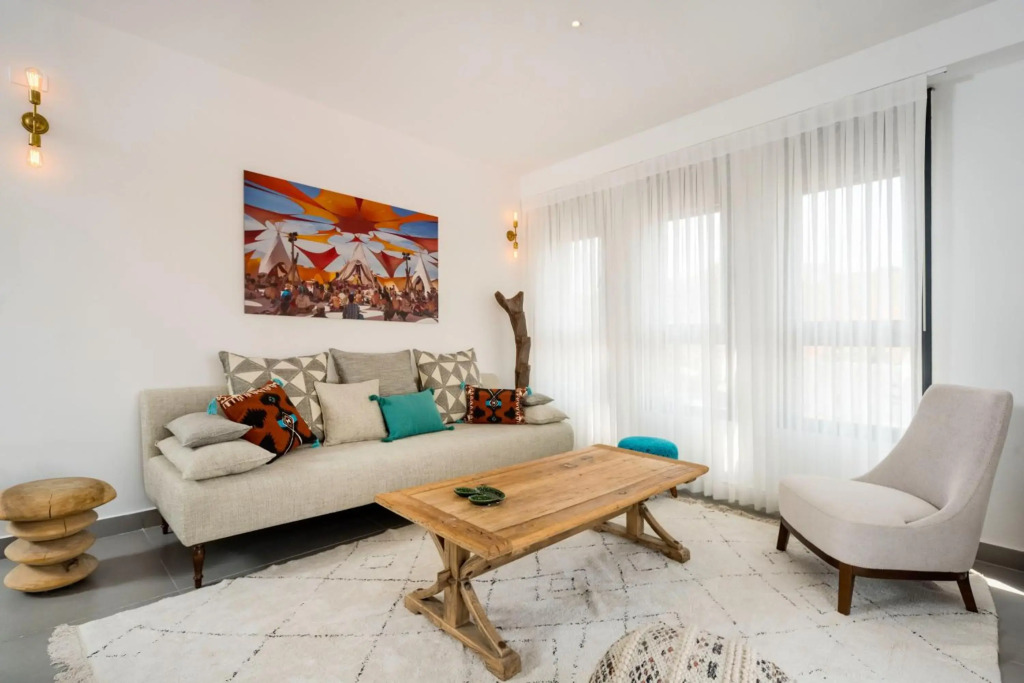 Walk to Beaches from an Arty New-Build Apartment