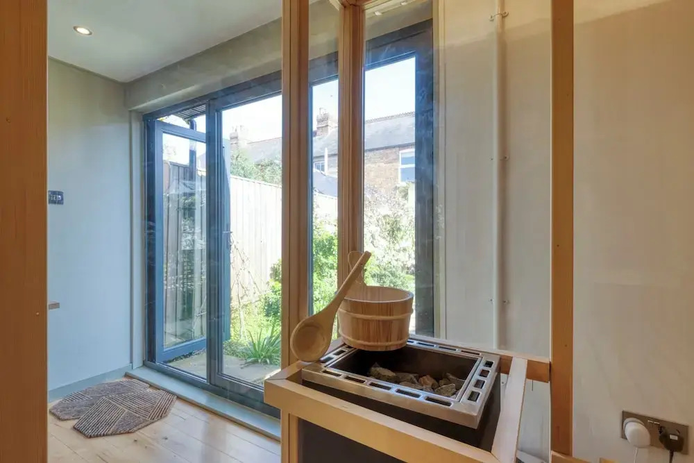 Stylish 2BD with Private Garden & Sauna
