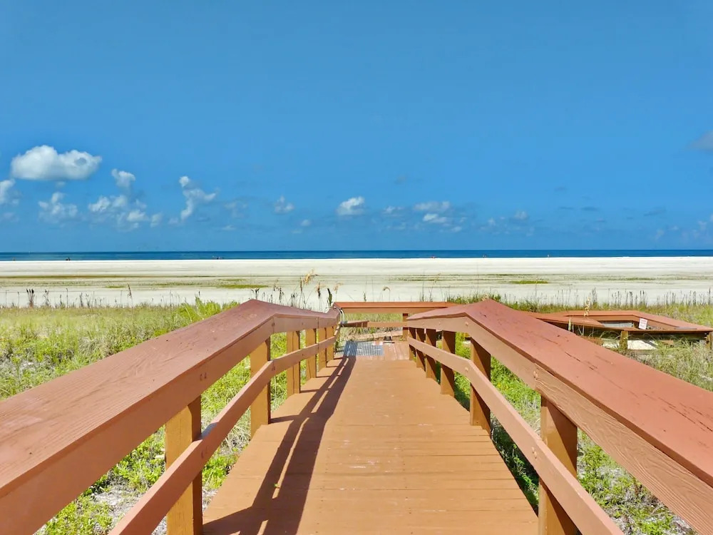 Inviting Beachfront Condo With Large Balcony and Pool