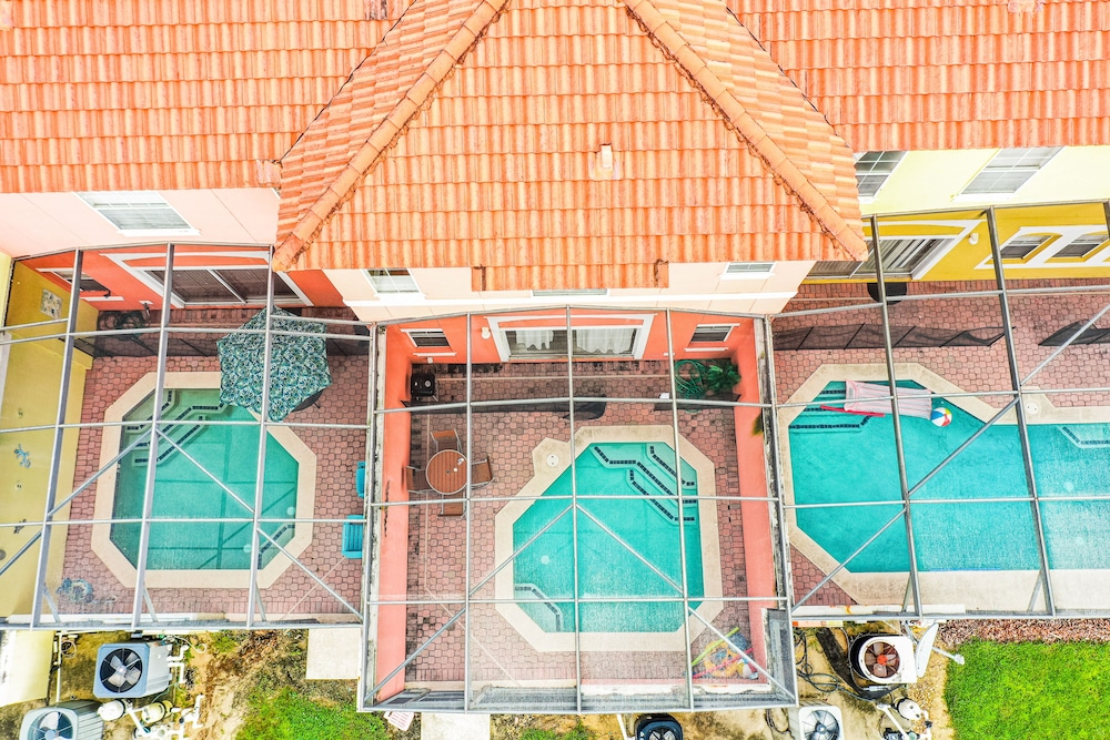 Two-story, Dog-friendly gem Near Theme Parks With Pool, Central AC & On-site gym