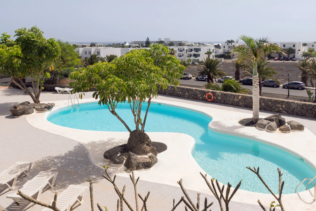 Apartamento OM con piscina y vistas al mar