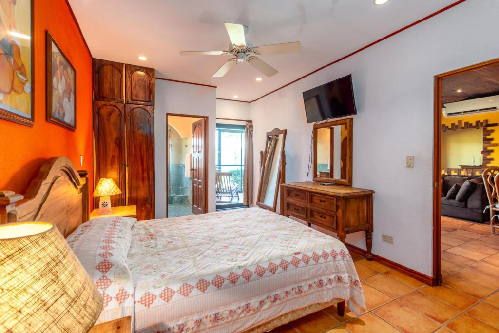 Beachfront Condo with Warm, Rustic Interiors & Direct Access to Playa Flamingo