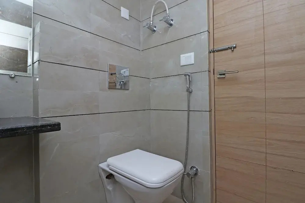Capital O 30624 Hotel Triton