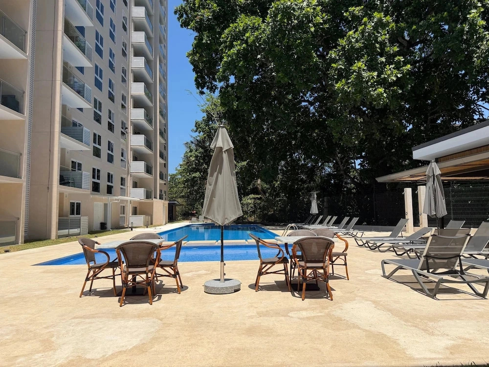 Ocean View Condo Steps to Beach & Comfort