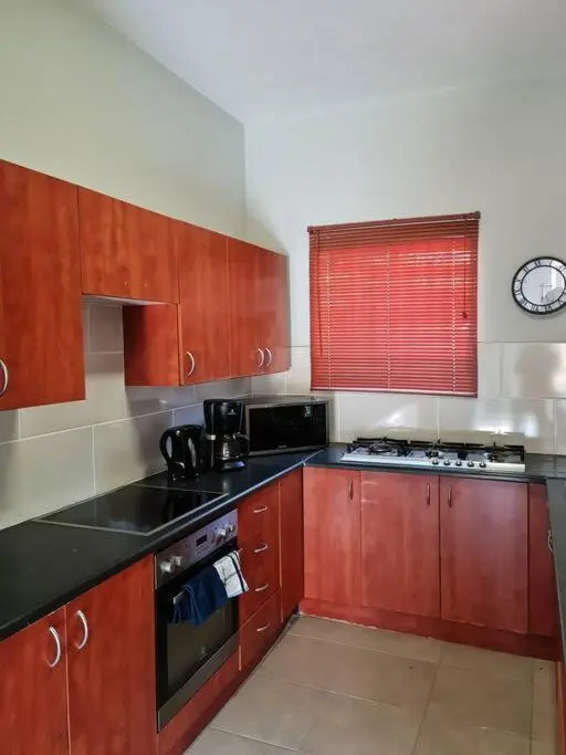 Justin's Place Lounge. An Exceptional Home with no Load Shedding, by The Grove Mall and Wilgers Hospital.