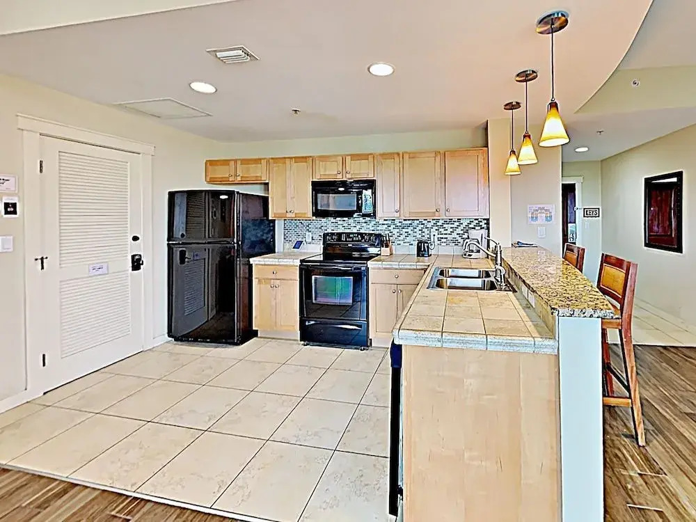 15100 Front Beach Road Condo Unit 917 by RedAwning