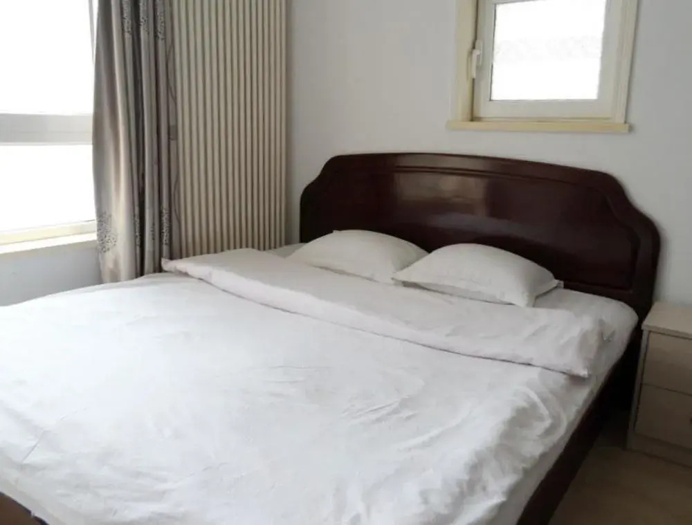 Dalian Jiujiuyuan Hotel Apartment
