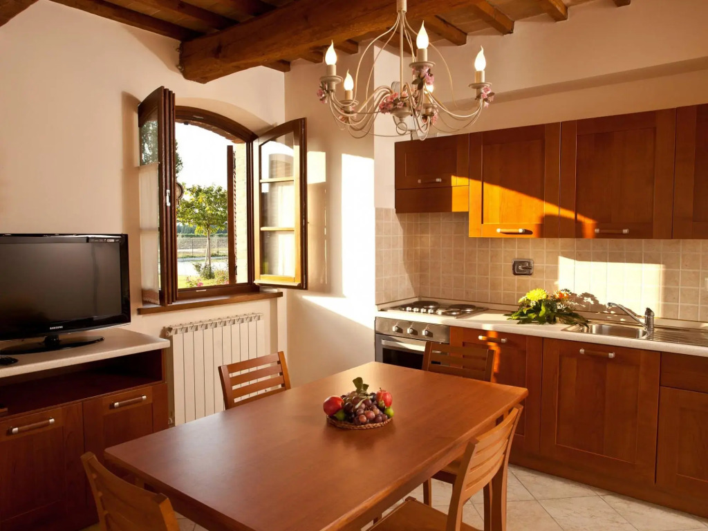 An agritourism complex with views of Assisi.