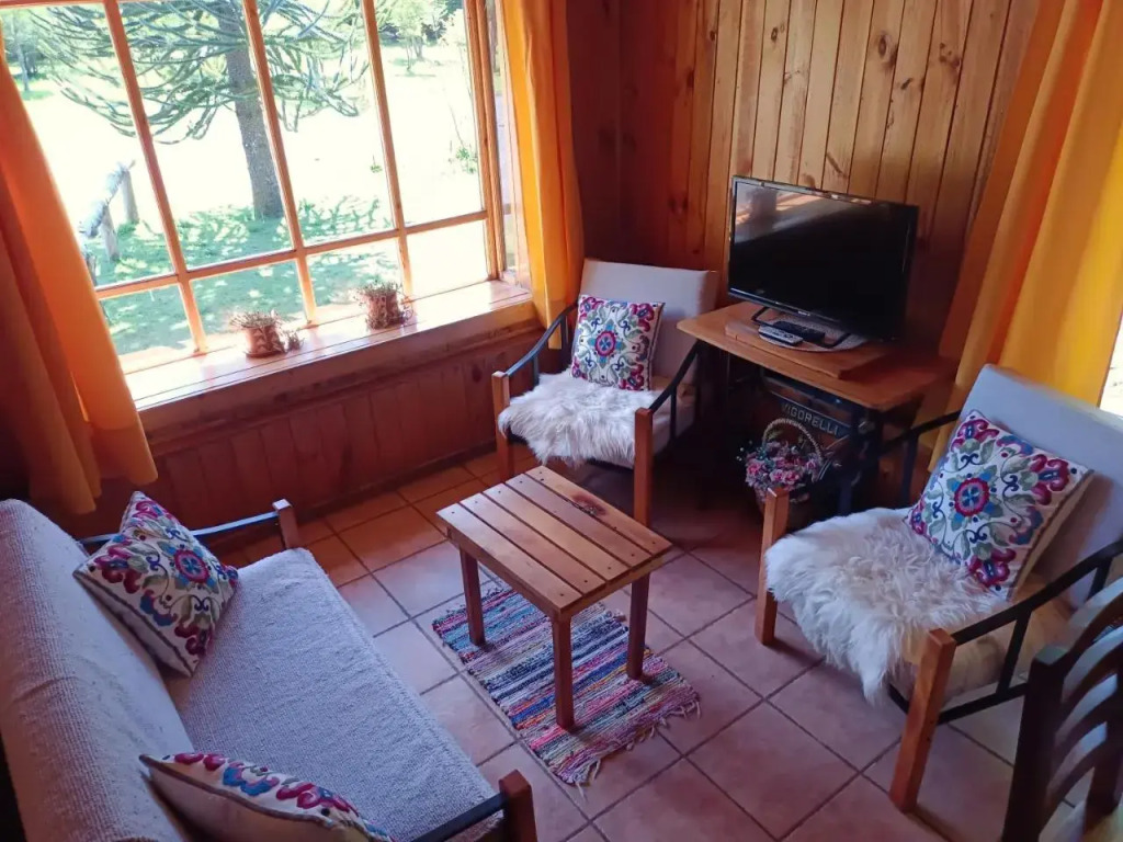 Hostal y Cabañas "El Coigüe"
