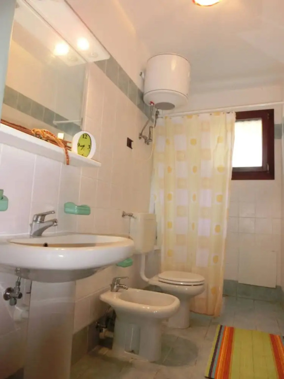 Feel at Home in This Apartment With Fenced Garden