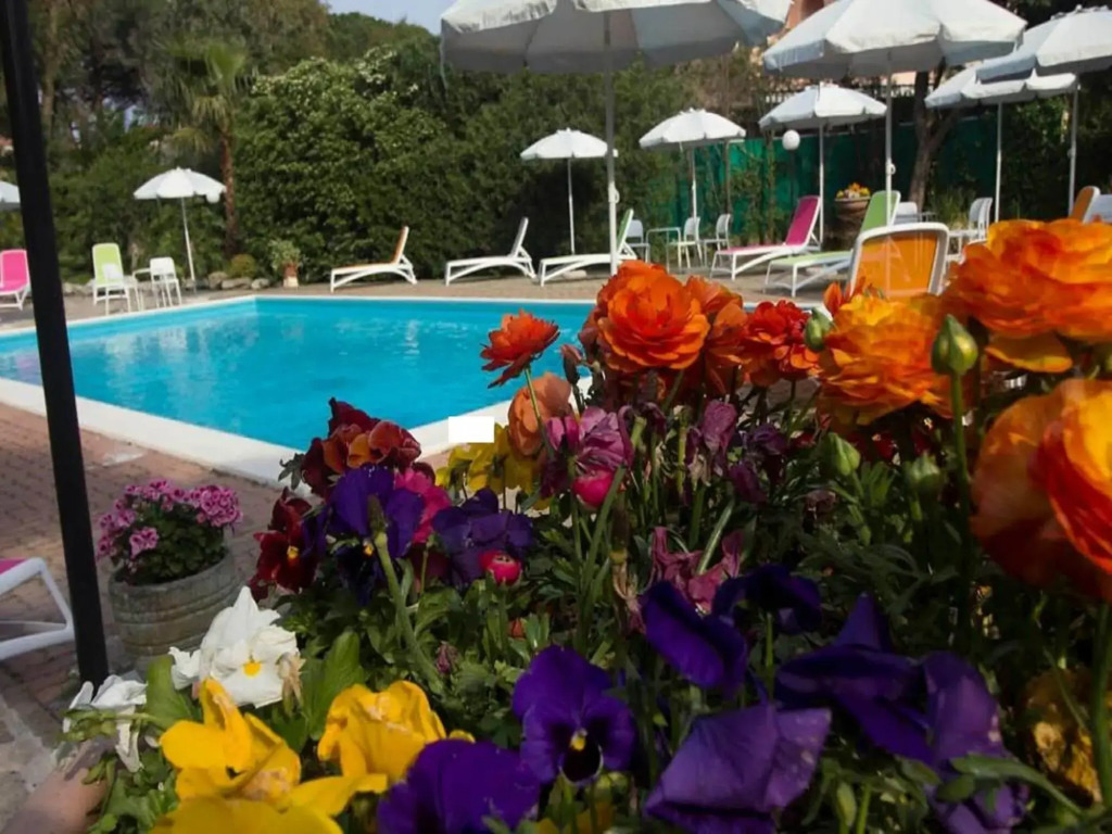 Snug holiday home in Loano with shared pool