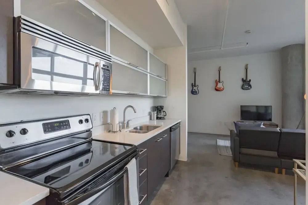 Industrial Chic Condo with Balcony