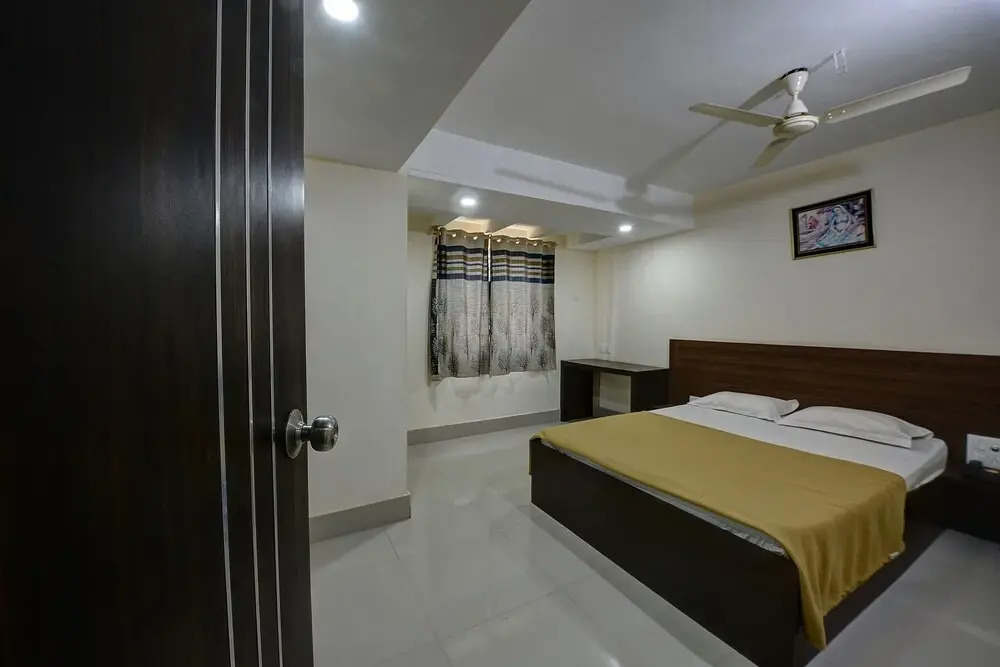 SPOT ON 37153 Karavali Paradise
