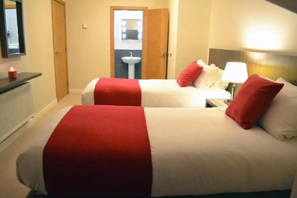 Carrick Plaza Suites and Apartments